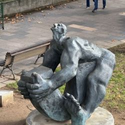 Slide 42: Statue alongside a kids' playground